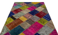 Mehrfarbiger handgeknüpfter Wollteppich mit geometrischem Muster 160x233 cm