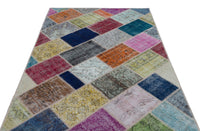 Geometrik Desenli Çok Renkli El Dokuma Yün Halı 151x226 cm