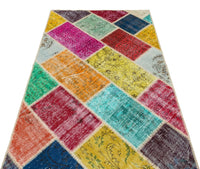 Bunter Wollteppich mit geometrischem Muster 122x186 cm