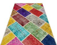 Mehrfarbiger handgeknüpfter Wollteppich mit geometrischem Muster 122x183 cm