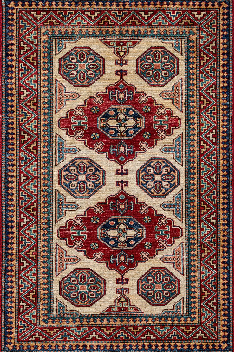 Cream & Red Ethnic Geometric Area Rug – in the living room