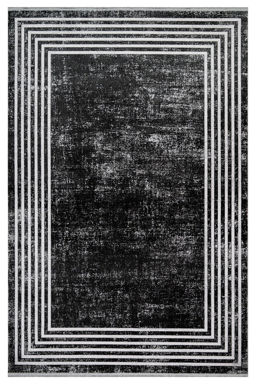 Black and White Geometric Area Rug with Distressed Finish – in the living room