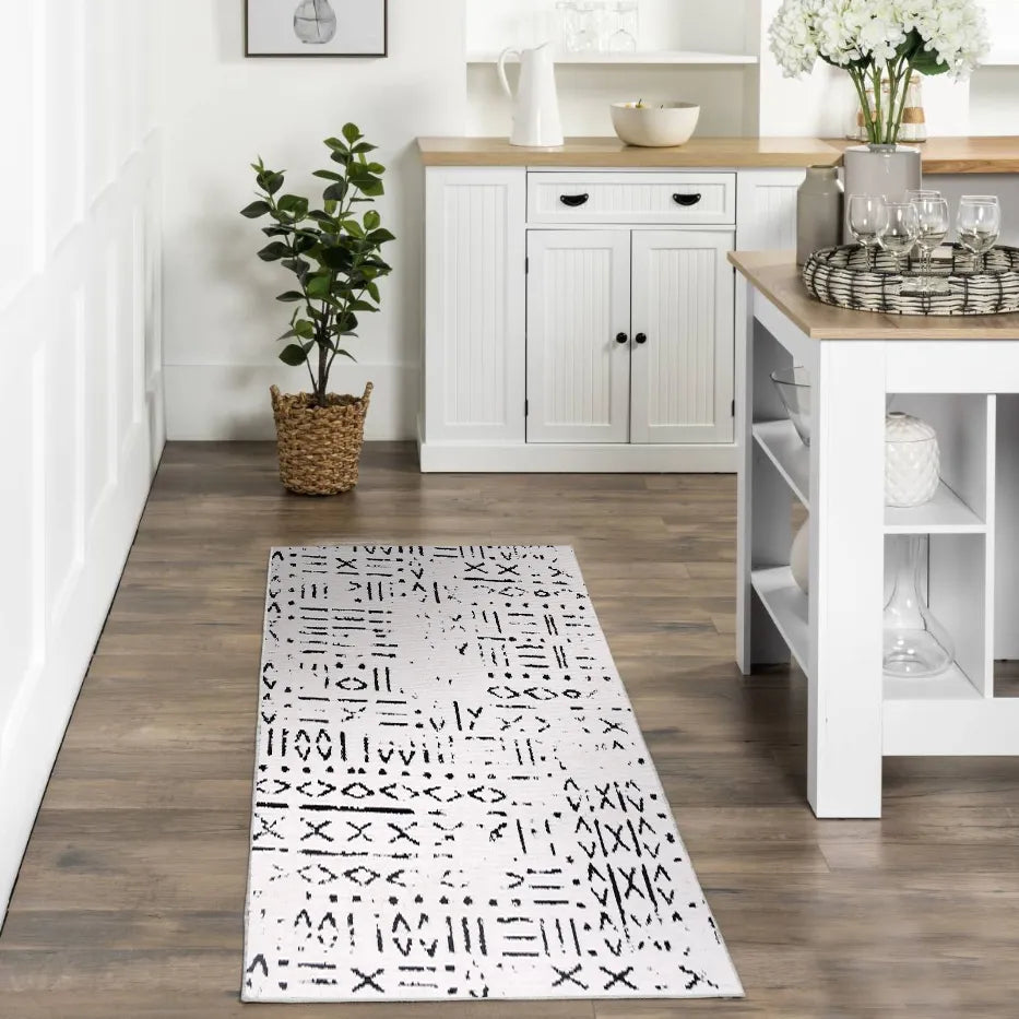 Kelaro Siyah Beyaz Geometrik Desenli Modern Makine Halısı – doku yakın çekim