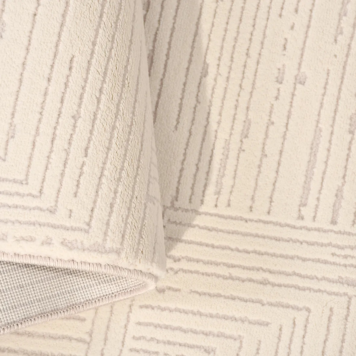 Sivno Koleksiyonu Krem Bej Modern Geometrik Desenli Halı – doku yakın çekim
