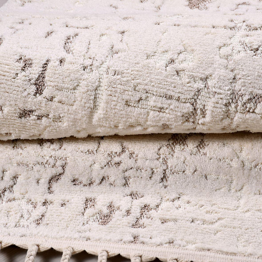 Cream and Silver Abstract Area Rug with Distressed Look – in the living room