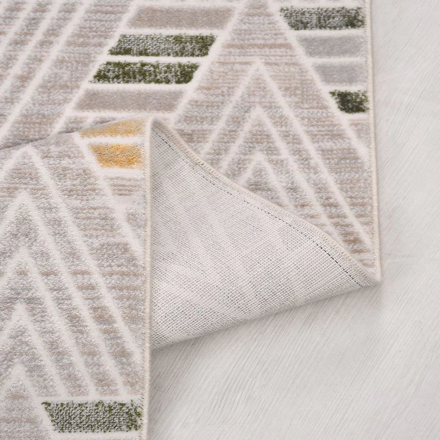 Grauer Wohnzimmerteppich mit geometrischem Muster in Creme – im Flur