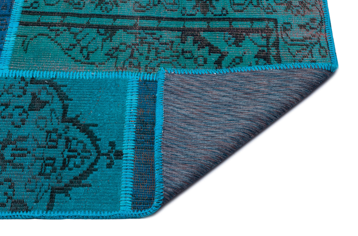 Kilva Turkuaz ve Lacivert Patchwork Desenli El Dokuma Halı 158x232 cm – detay görünümü