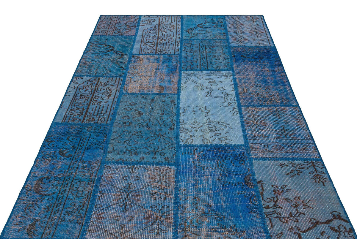 Kilva Mavi ve Lacivert Patchwork Desenli El Dokuma Halı 162x231 cm – detay görünümü
