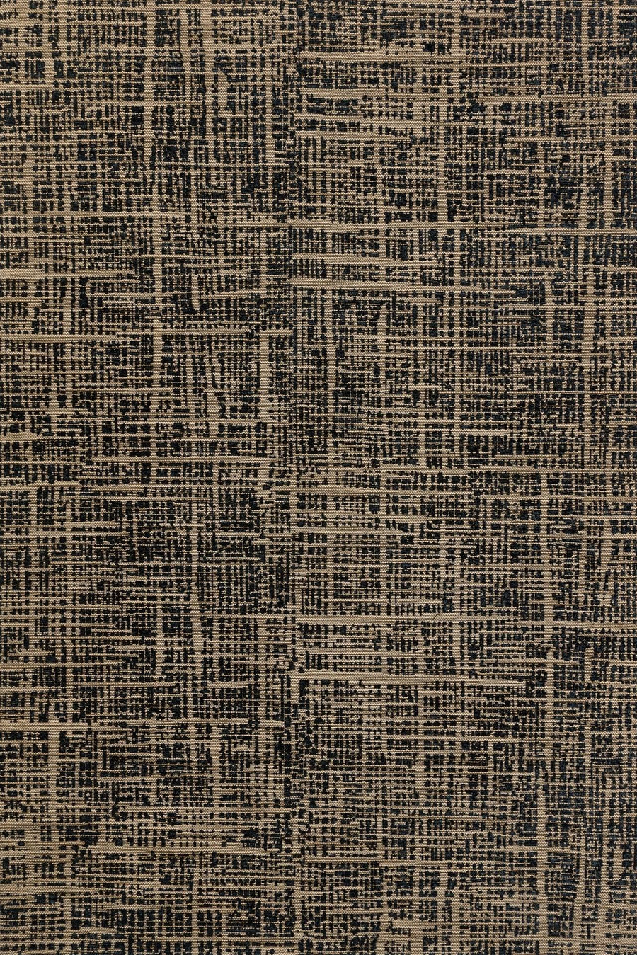 Geometric Area Rug in Anthracite and Cream – in the living room