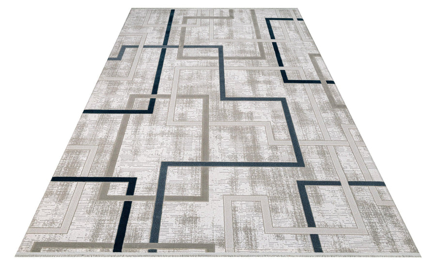 Geometric Light Grey and Navy Blue Area Rug – in the living room