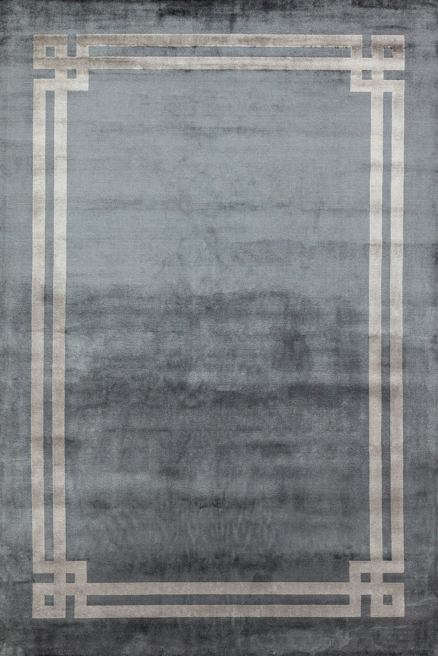 Grey and Beige Geometric Area Rug – in the living room