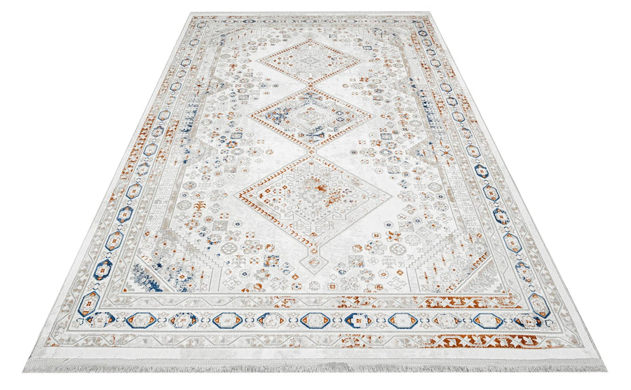 Weißer Teppich mit blauem geometrischem Muster – im Wohnzimmer