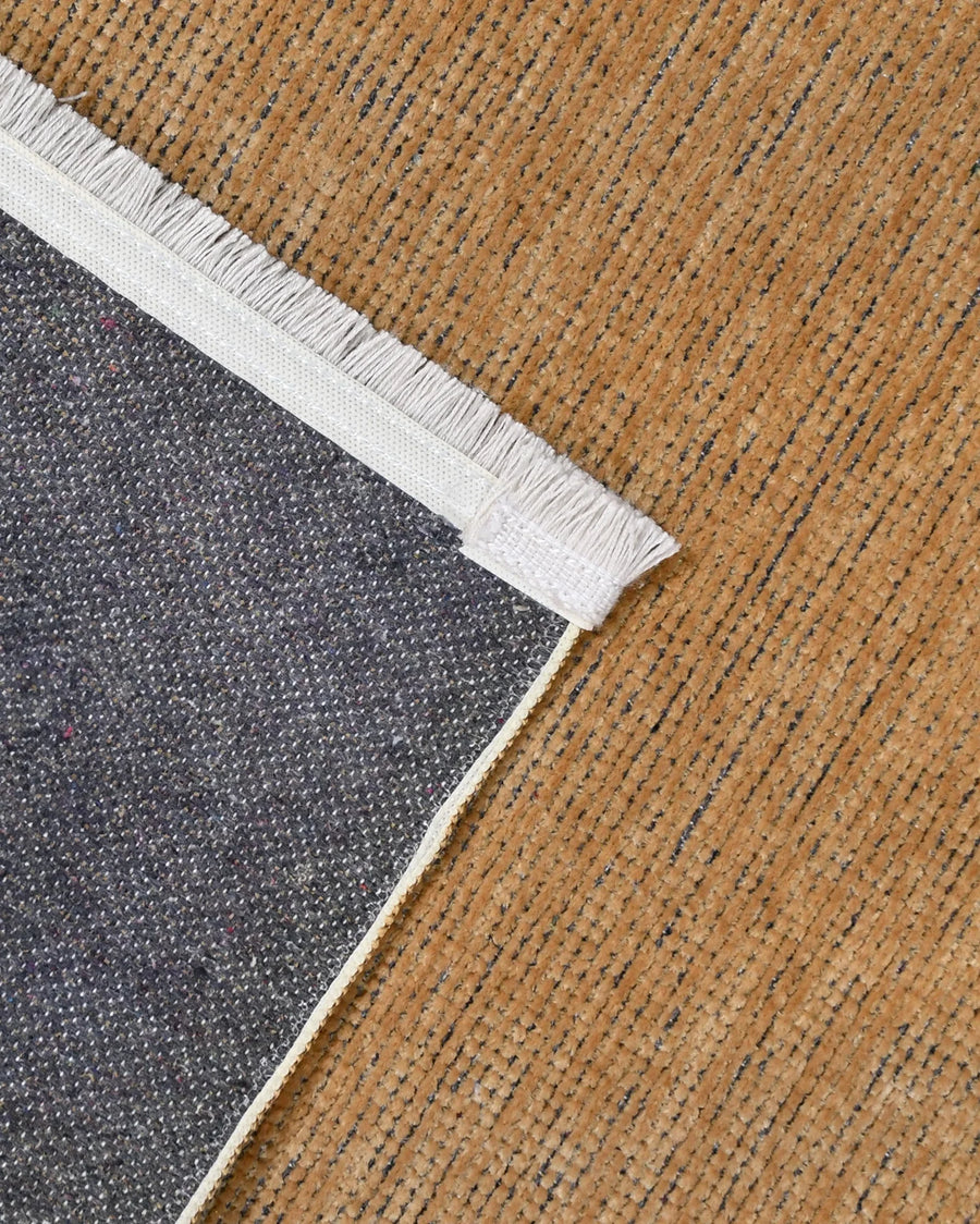 Modern Tan Brown Solid Color Jute-Weave Rug – in the hallway