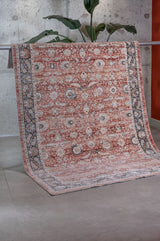 Tapis tissé à la machine classique Lasli orange à motif de médaillon