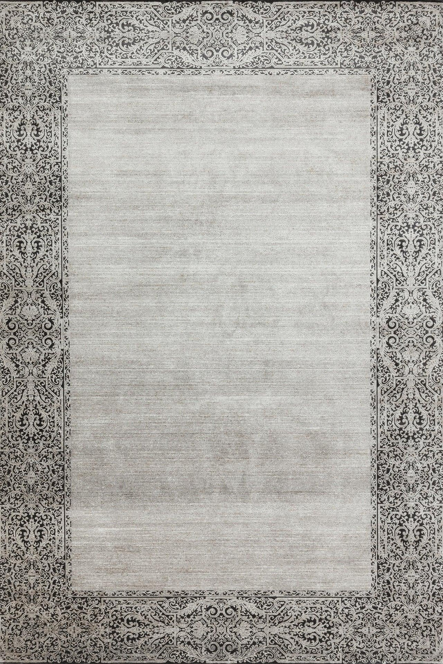 Moderner Teppich mit Bordüre in Anthrazitgrau – im Wohnzimmer