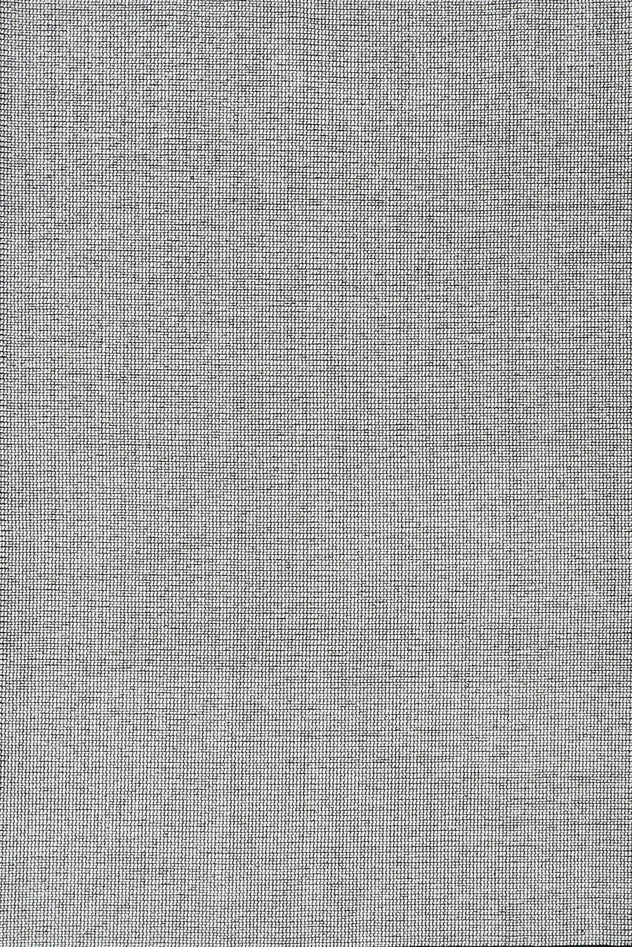 Solid Light Grey Textured Area Rug – in the living room