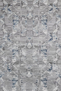 Grauer Teppich mit geometrischem Muster in Blau