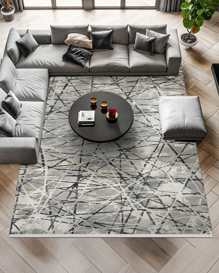 Modern Geometric Grey and White Area Rug – in the living room