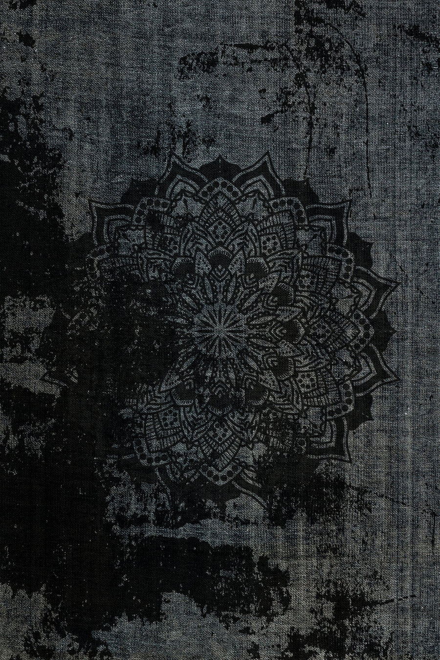 Black and Grey Geometric Distressed Area Rug – in the living room