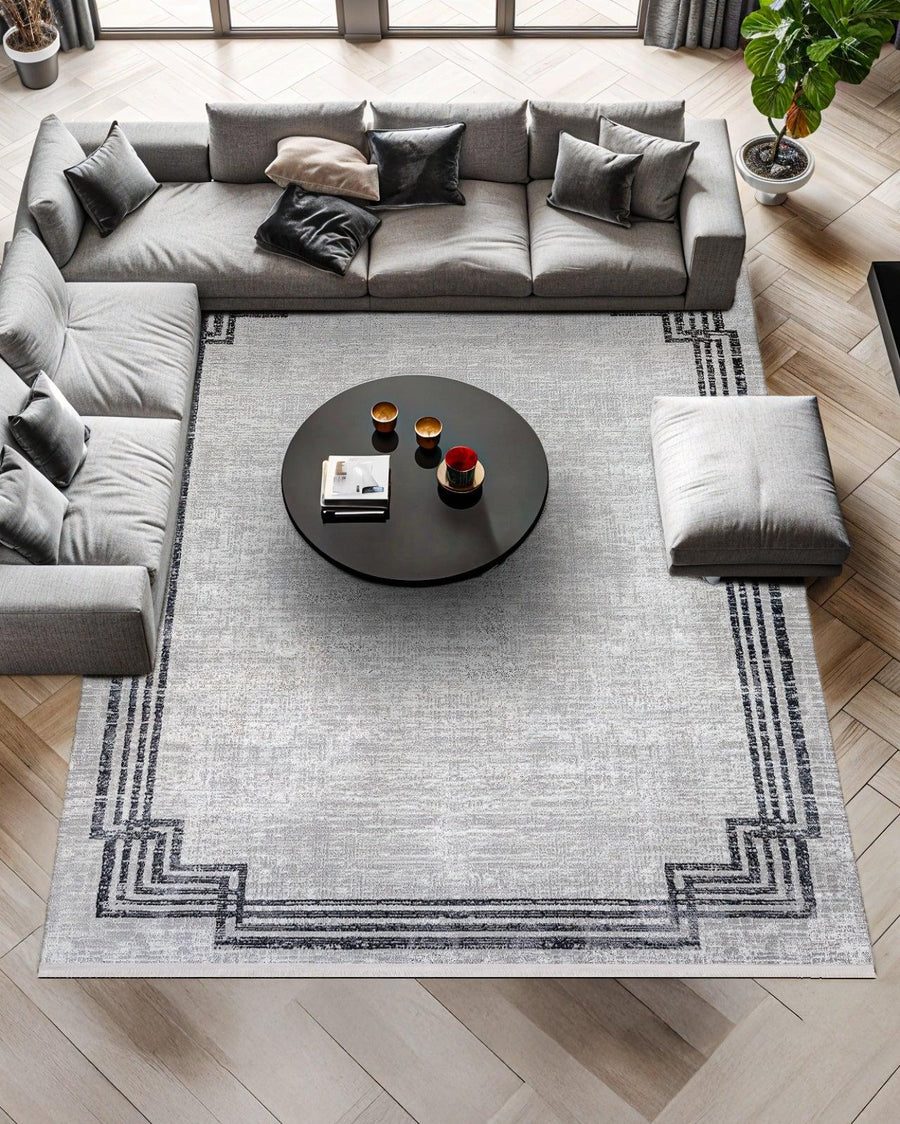 Anthrazit Teppich mit geometrischem Muster in Grau – im Wohnzimmer
