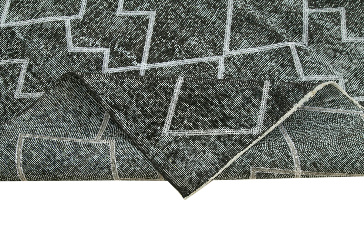 Kesle Antrasit Beyaz Geometrik Desenli 30-70 Yıllık El Dokuma Halı 210x298 cm – kenar detayı