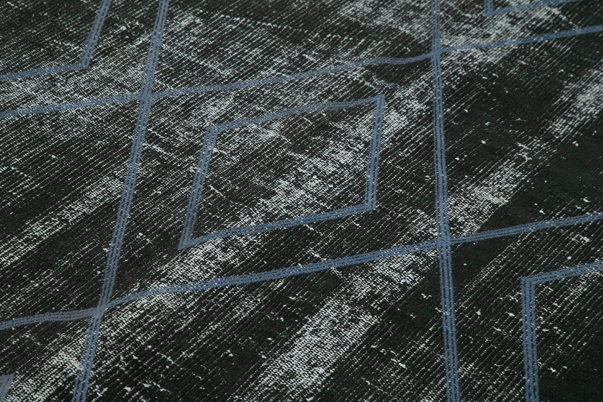 Kesle Siyah Gri Geometrik Desenli Yün Halı 180x264 cm – mekânda kullanım