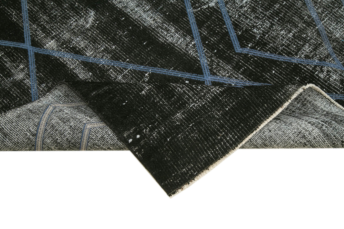 Kesle Siyah Gri Geometrik Desenli Yün Halı 180x264 cm – kenar detayı