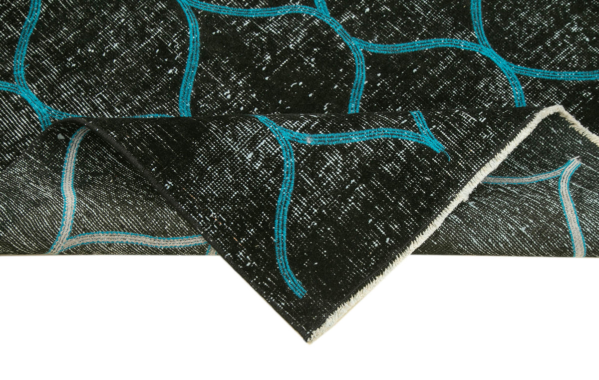 Kesle Siyah Turkuaz Geometrik Modern El Dokuma Halı 112x191 cm – kenar detayı