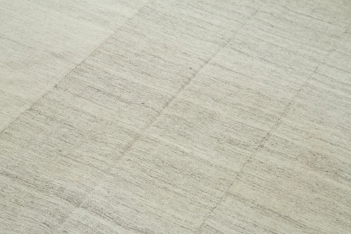 Saniri Bej Soyut Desenli Yün El Dokuma Halı 172x310 cm – mekânda kullanım