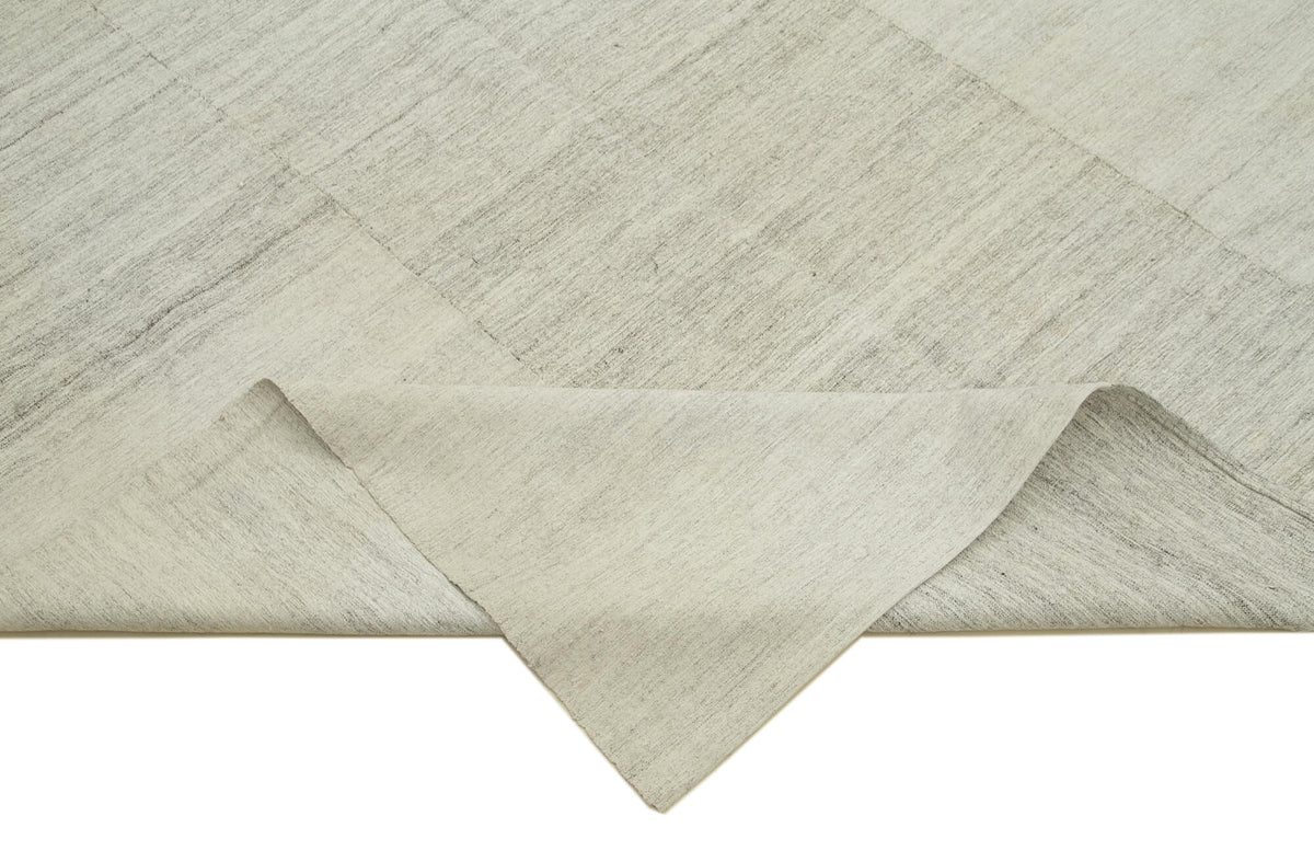 Saniri Bej Soyut Desenli Yün El Dokuma Halı 172x310 cm – kenar detayı