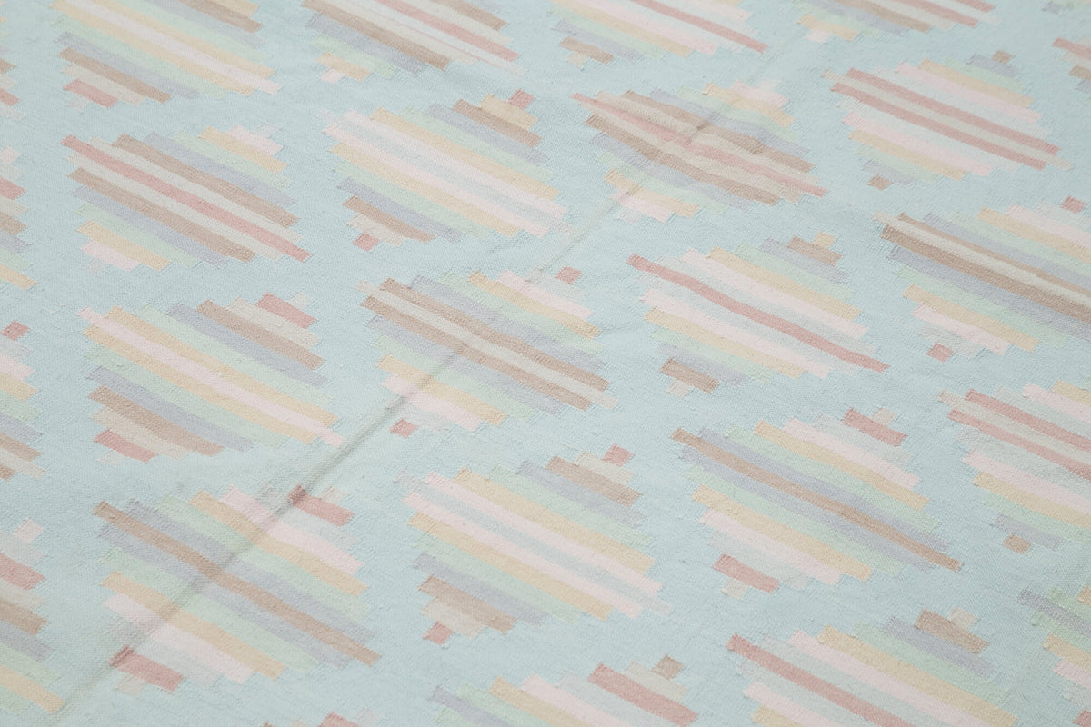 Navamo Dokuma Modern Bej ve Turkuaz Bordürlü Kilim 183x269 cm 38264 – mekânda kullanım