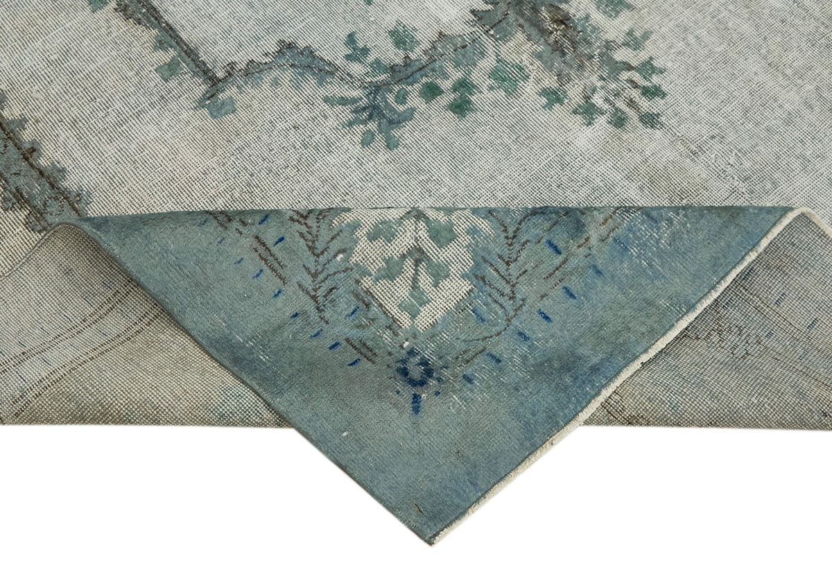 Besko Kırmızı Mavi Madalyon Oyma El Dokuma Halı 220x310 cm – kenar detayı