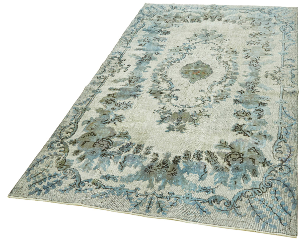 Besko Kırmızı Mavi Madalyon Desenli Eskitme Dokuma Halı 185x295 cm – doku yakın çekim