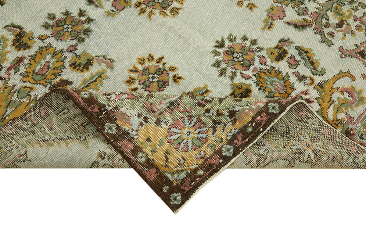 Besko Krem Yeşil Klasik Çiçekli Oyma El Dokuma Halı 186x302 cm – kenar detayı