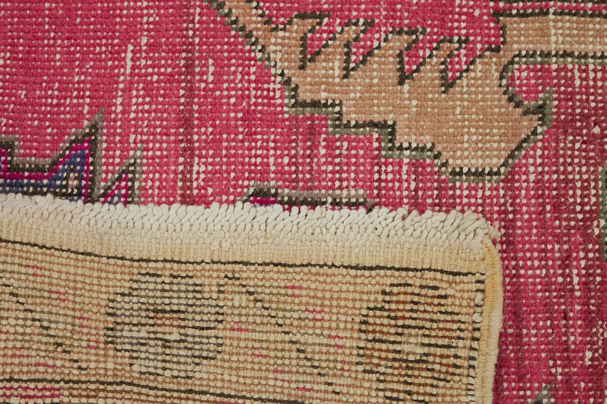 Kavale Pembe Madalyon Desenli Yün ve Pamuk El Dokuma Halı 140x236 cm – kenar detayı