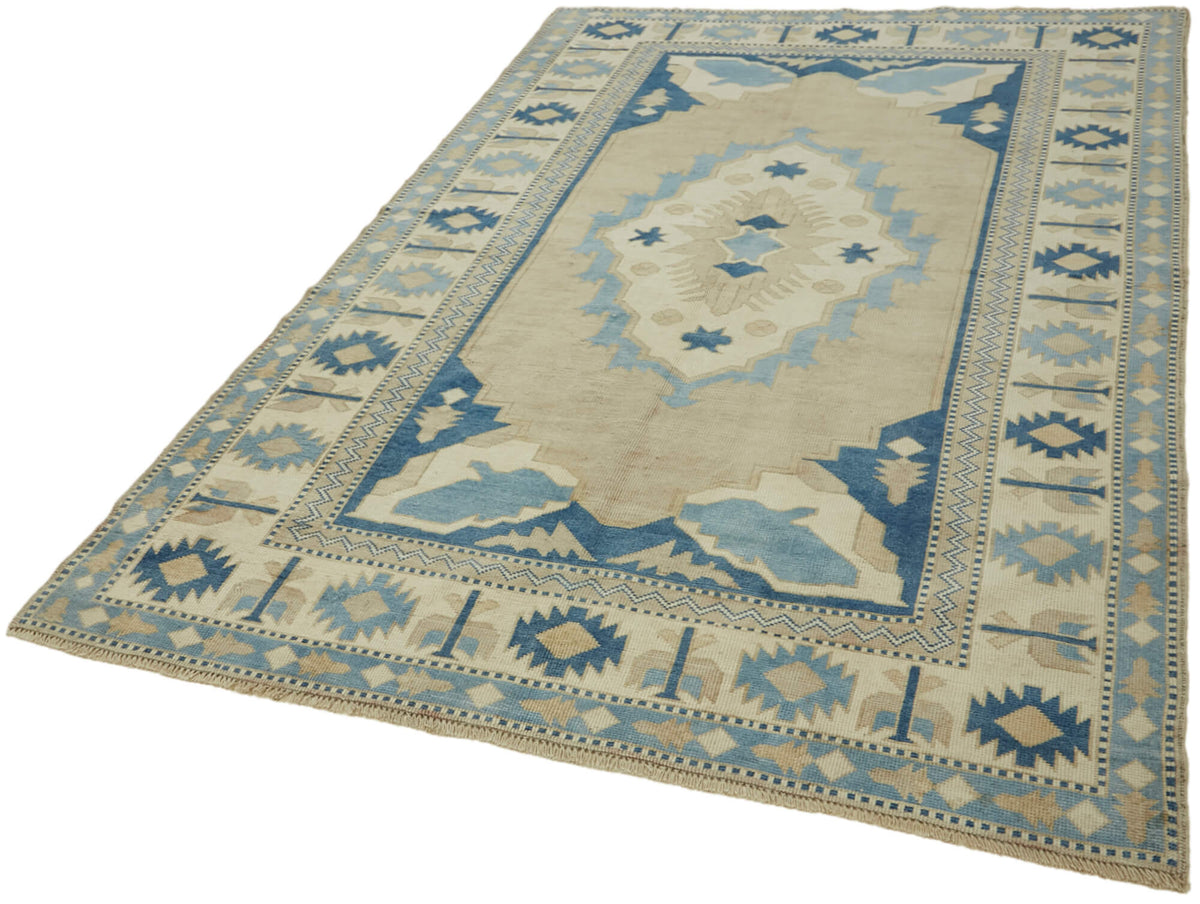 Kavale Bej Mavi Madalyon Desenli Geometrik El Dokuma Halı 169x257 cm – doku yakın çekim