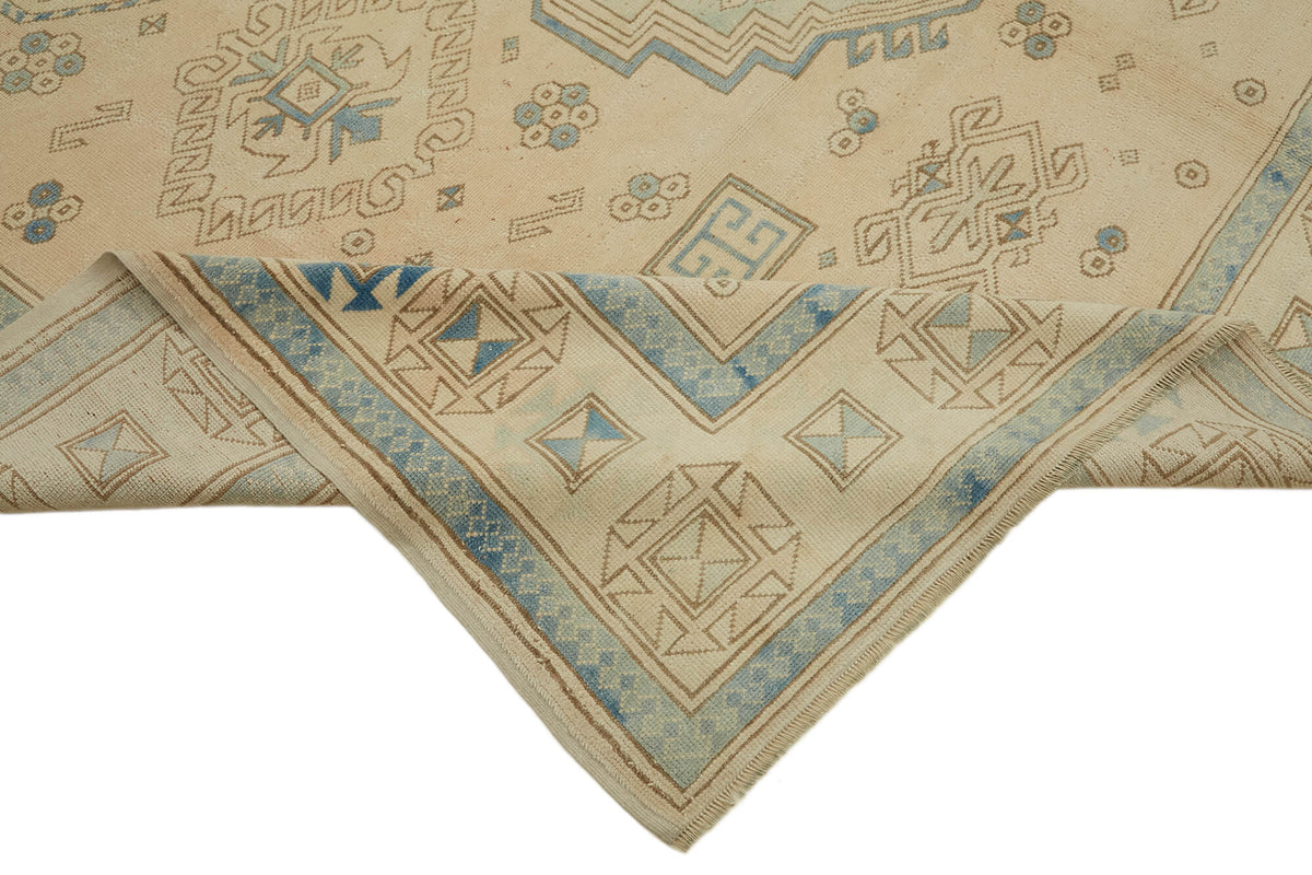 Rusvo Bej Mavi Halı Madalyon Desenli Vintage El Dokuma 263x348 cm – kenar detayı