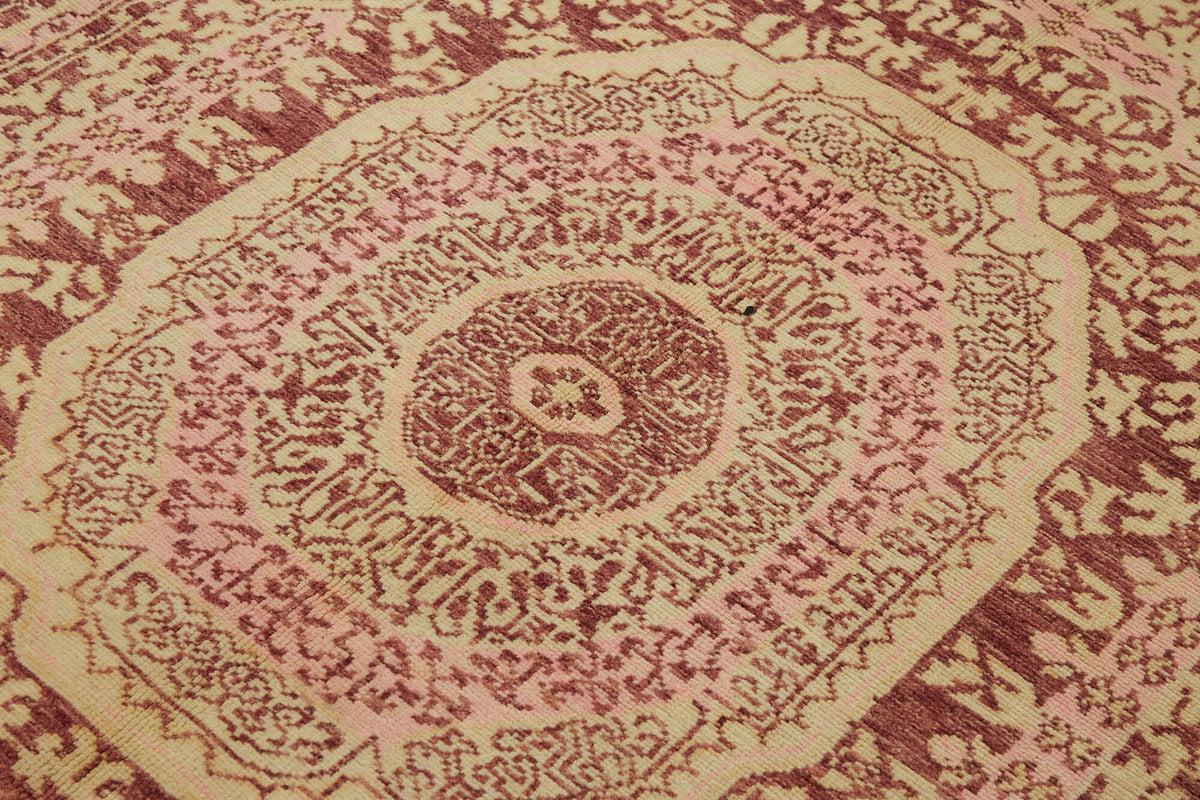 Kavima Pembe Bej Madalyon Göbek Desenli Yün El Dokuma Halı 164x216 cm – mekânda kullanım