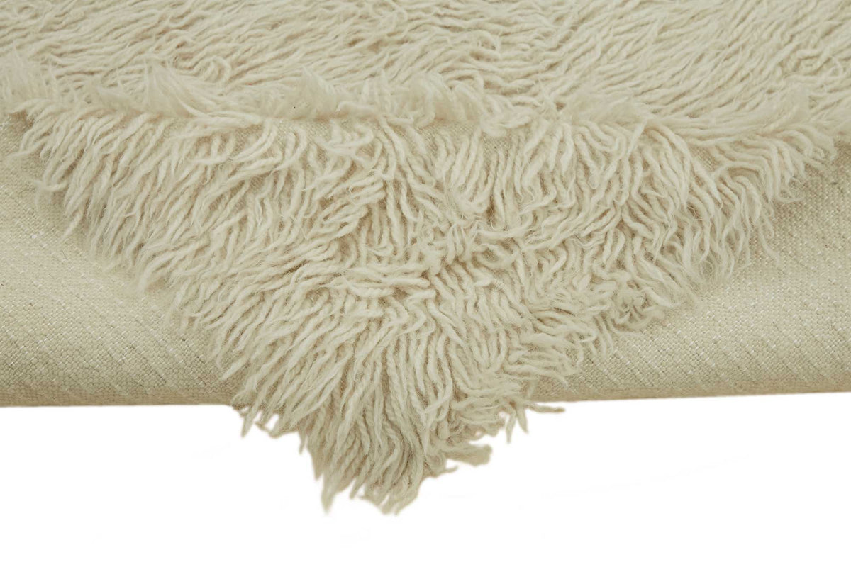Timvi Desensiz Düz Bej ve Yeşil Renkli Tulu Halı 80x205 cm – kenar detayı