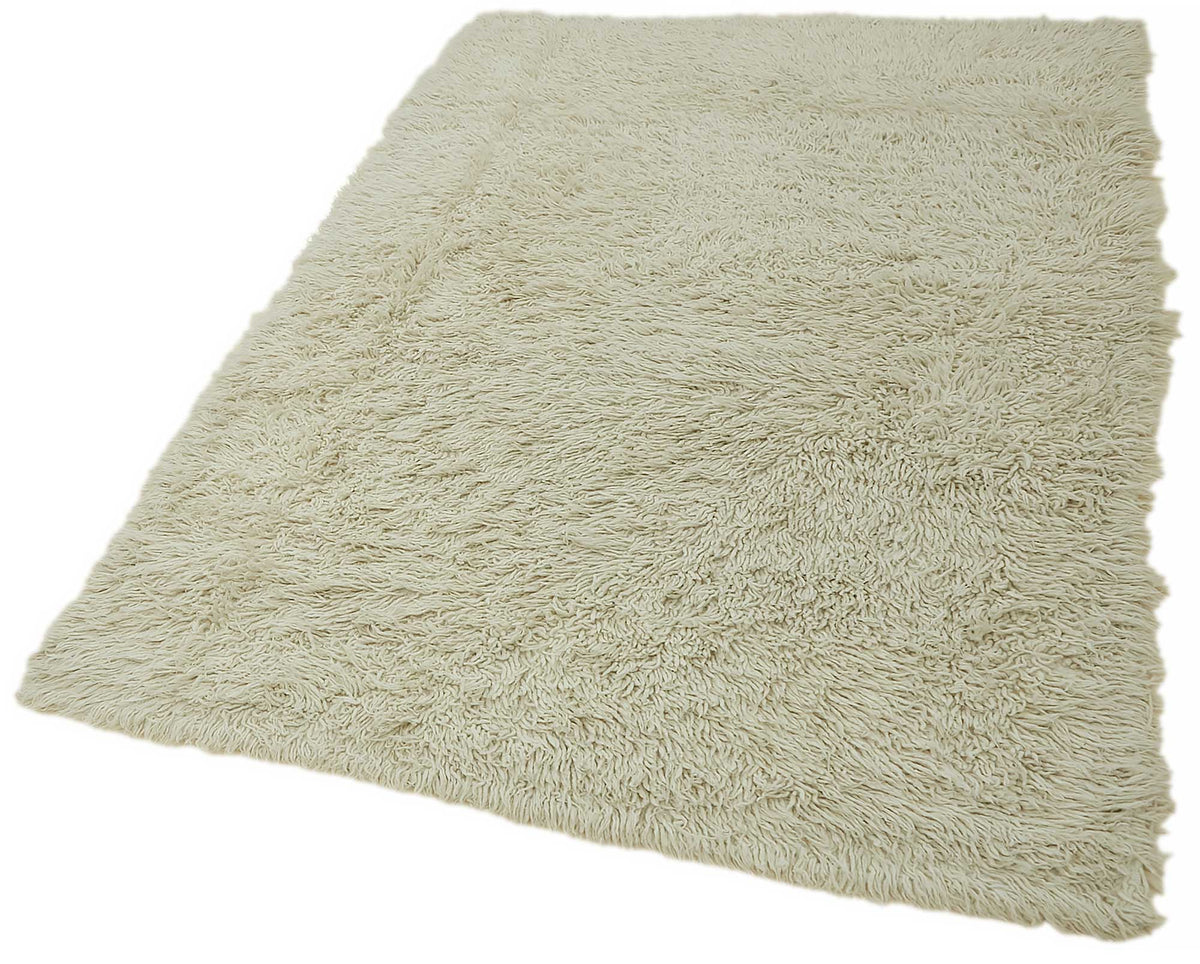 Timvi Desensiz Düz Bej ve Yeşil Renkli Tulu Halı 130x200 cm – doku yakın çekim