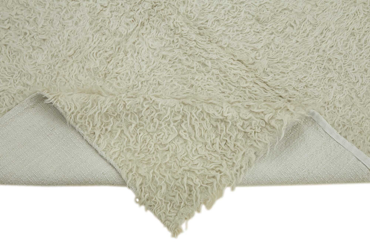 Timvi Ekru Yeşil Düz Vintage El Dokuma Halı 147x150 cm – kenar detayı
