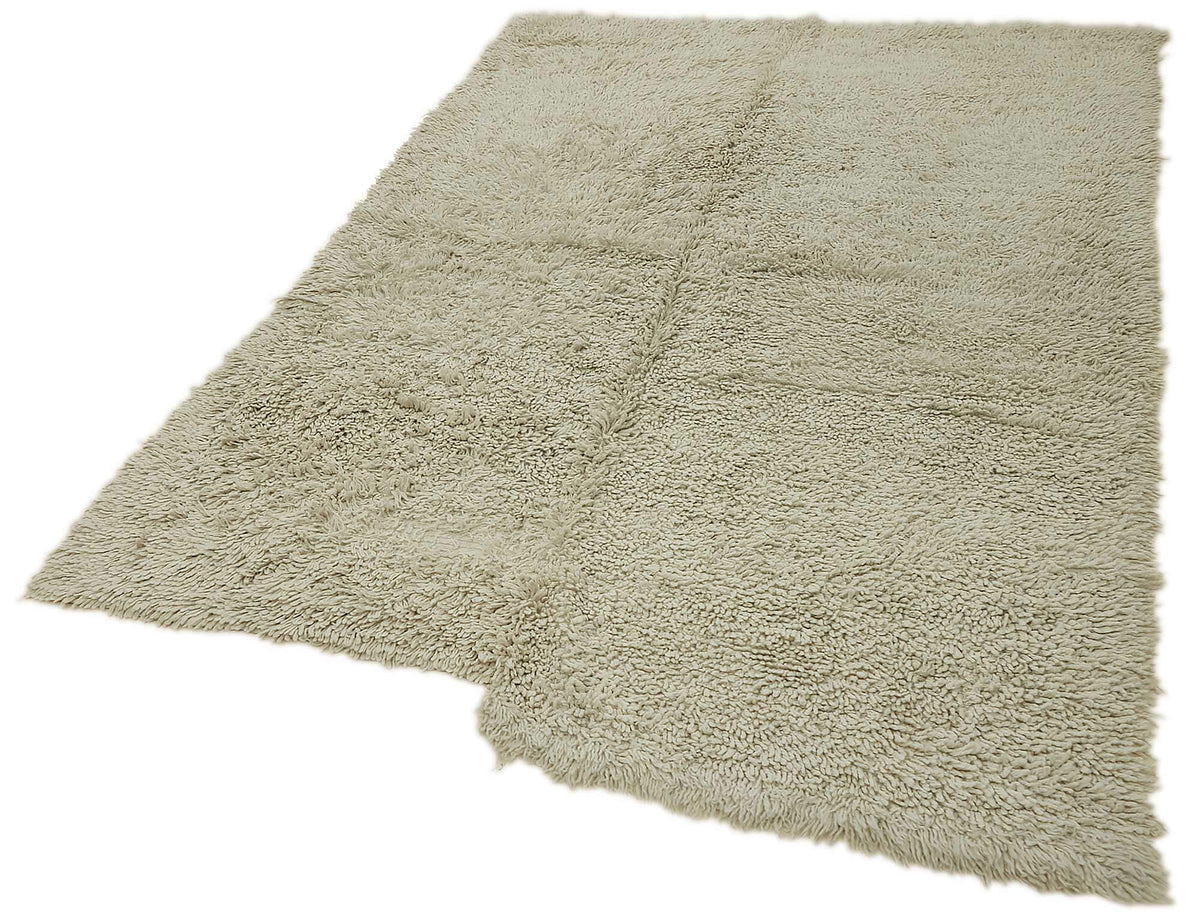 Timvi Bej Gri Düz Shaggy El Dokuma Halı 164x232 cm – doku yakın çekim
