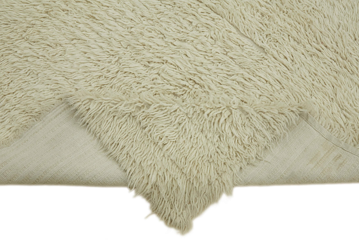 Timvi Desensiz Düz Yeşil ve Bej Vintage Kare Tulu Halı 195x218 cm – kenar detayı