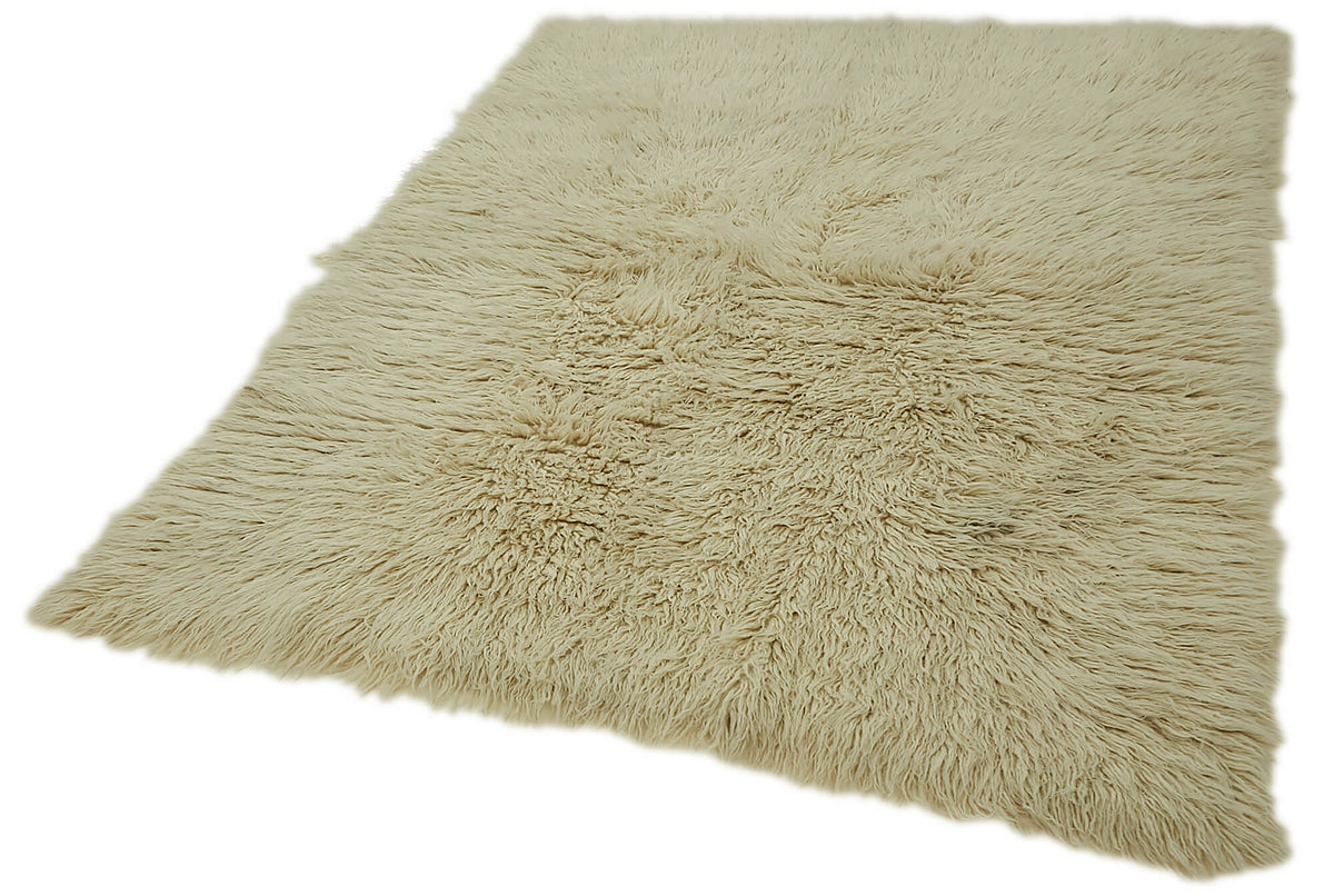 Timvi Desensiz Düz Yeşil ve Bej Tonlarda Vintage Tulu Halı 152x196 cm – doku yakın çekim
