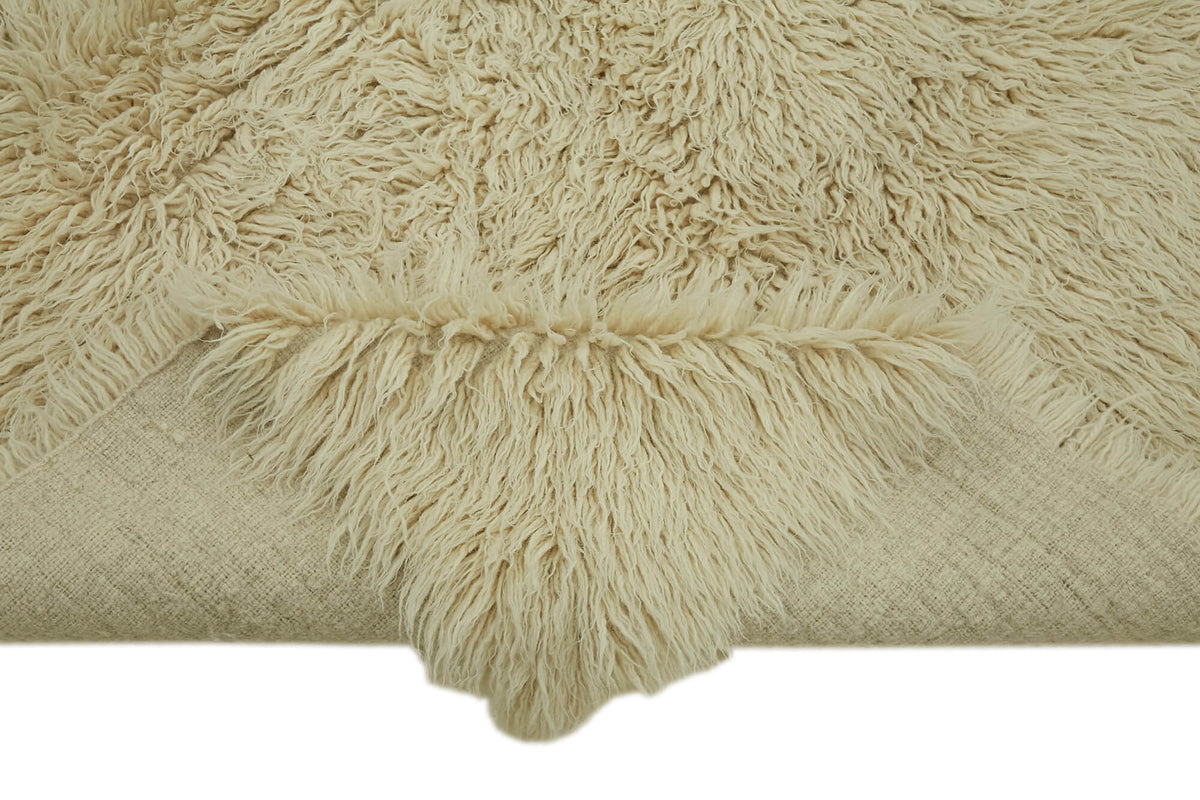 Timvi Desensiz Düz Yeşil ve Bej Tonlarda Vintage Tulu Halı 152x196 cm – kenar detayı