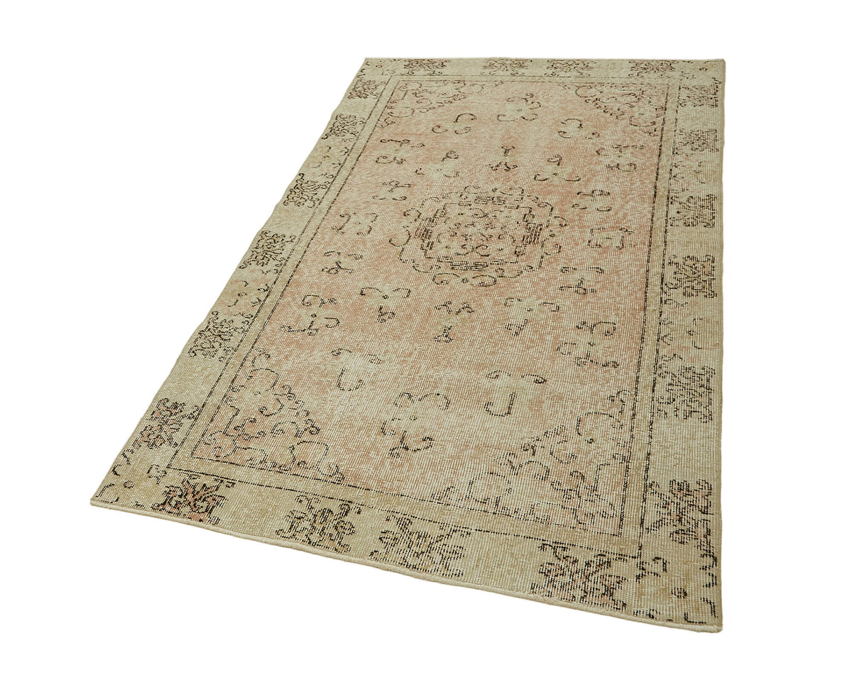 Tavik Bej Pembe Madalyon Desenli Yün El Dokuma Halı 113x200 cm – doku yakın çekim