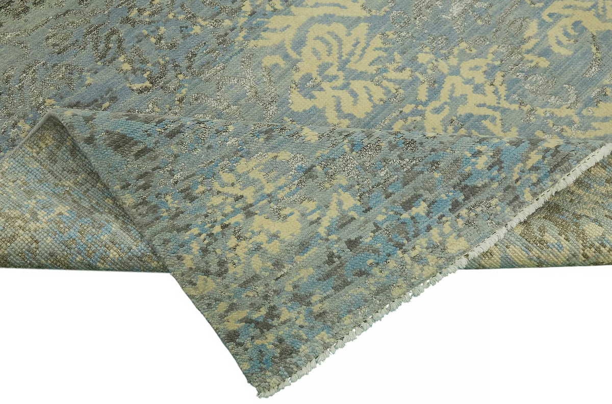 Nivro Soyut Desenli Mavi Bej El Dokuma Uşak Halı 280x363 cm – kenar detayı