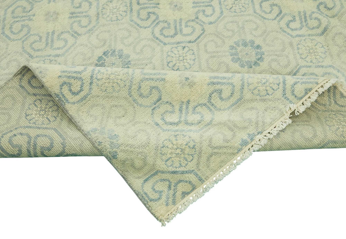 Nivro Geometrik Desenli Bej ve Mavi Dokuma Modern Halı 278x358 cm – kenar detayı