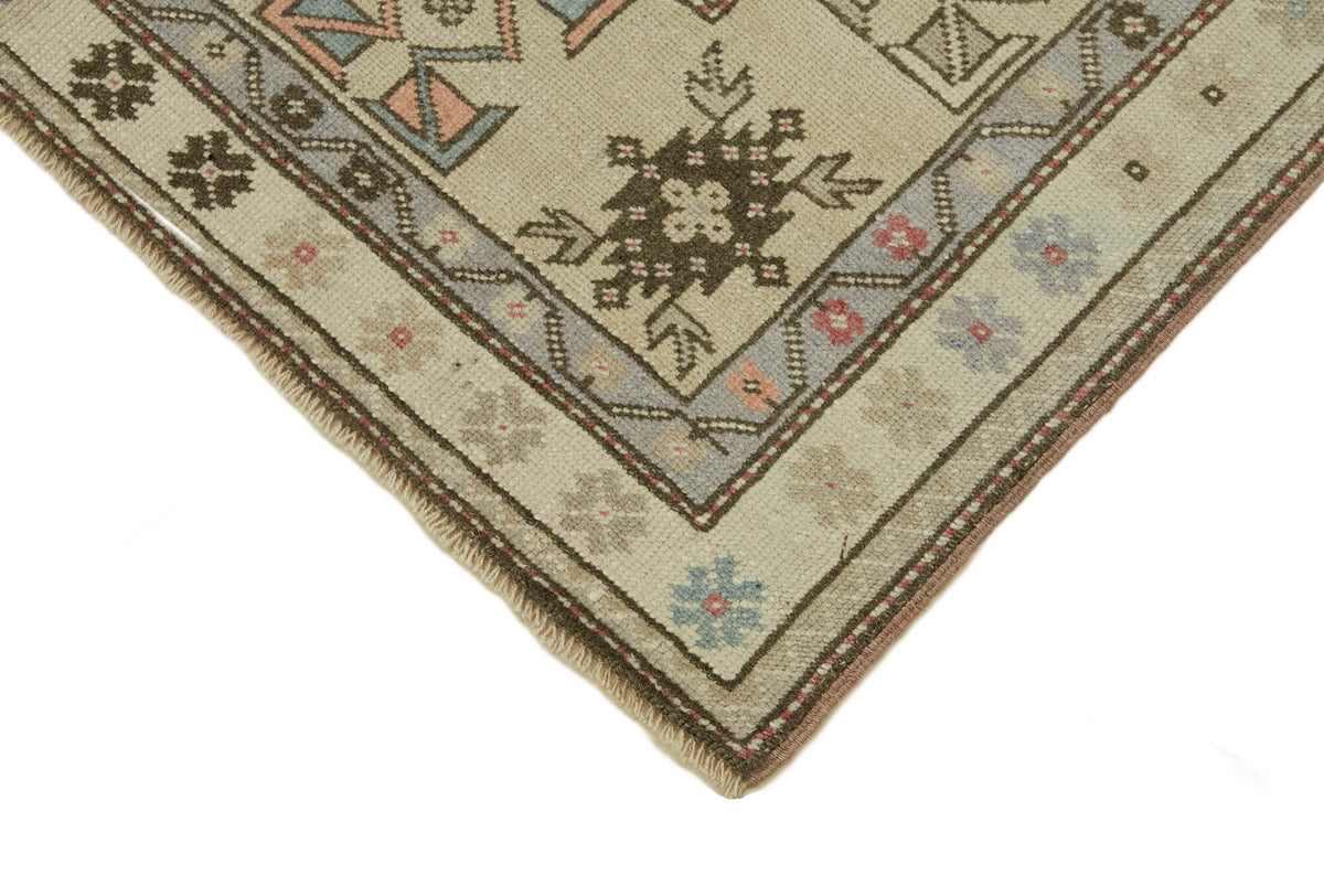 Gekro Bej Kırmızı Geometrik Desenli Yün El Dokuma Halı 123x229 cm – detay görünümü