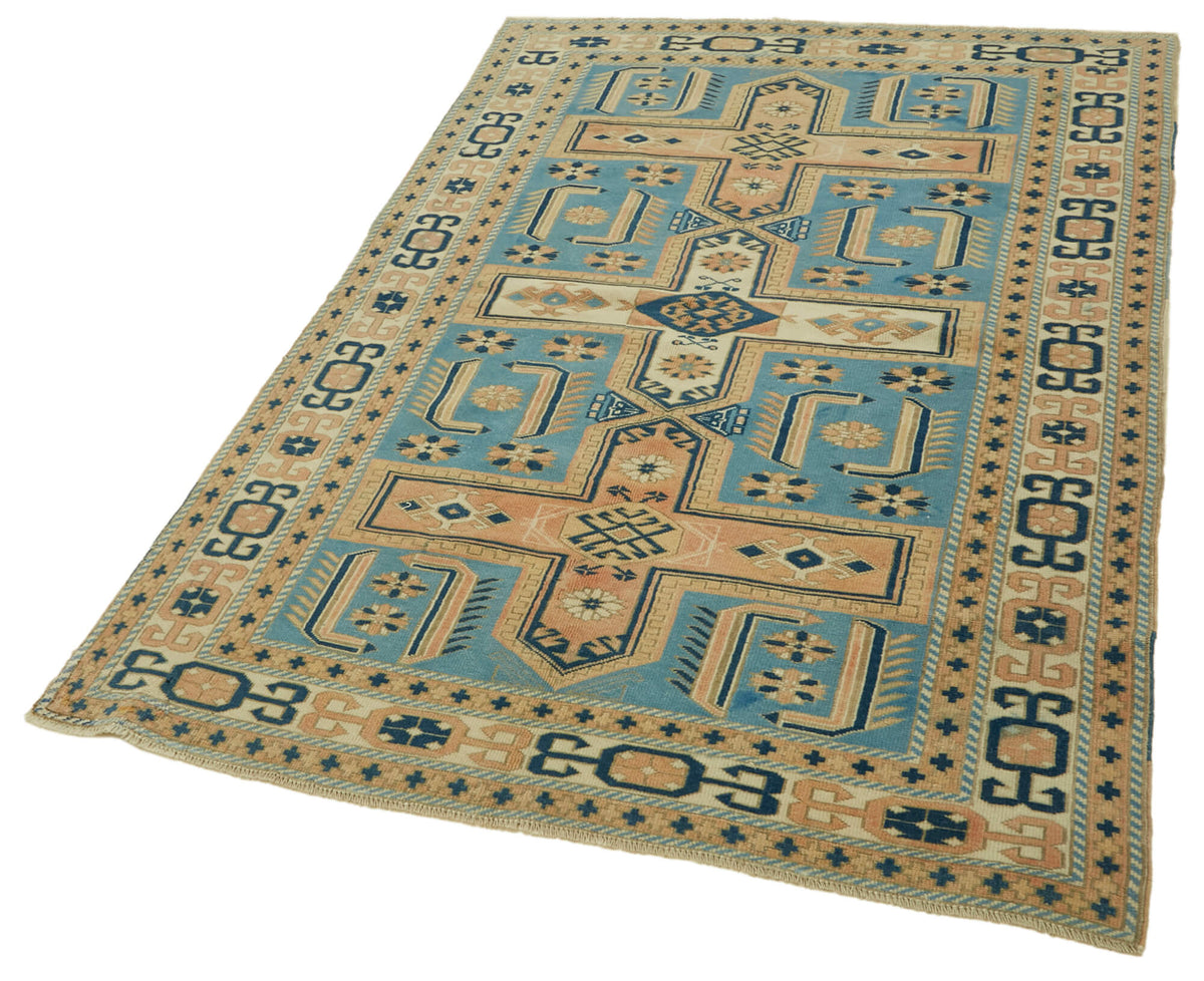 Gekro Mavi Bej Madalyon Desenli Anadolu El Dokuma Halı 123x189 cm – doku yakın çekim